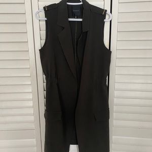 Khaki coloured vest with shoulder detail